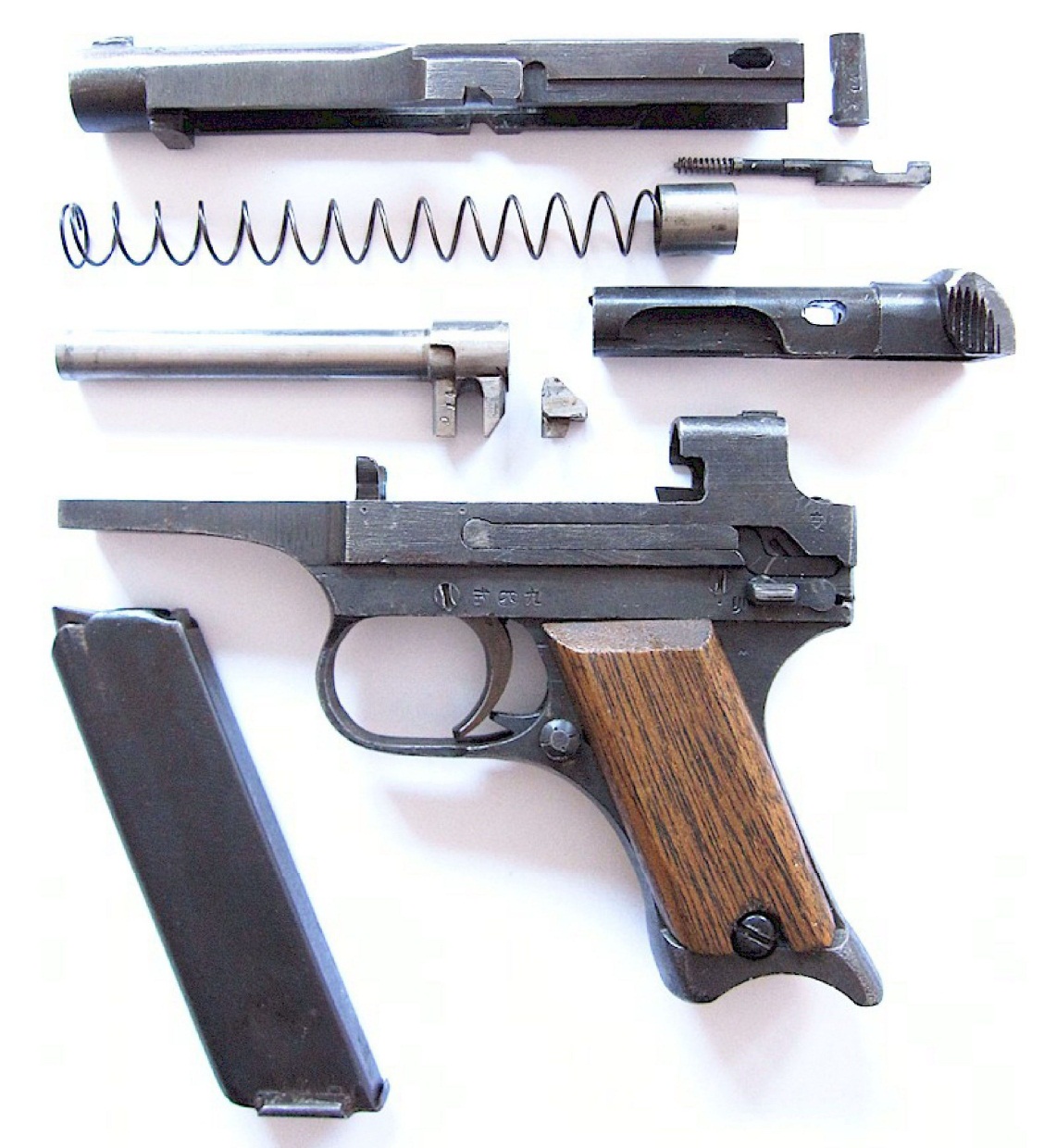 disassemble Japanese Type 94 Nambu pistol